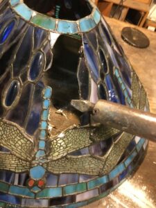 Tiffany style bent slag glass panel repair